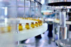 brown-glass-bottle-filling-at-pr.png